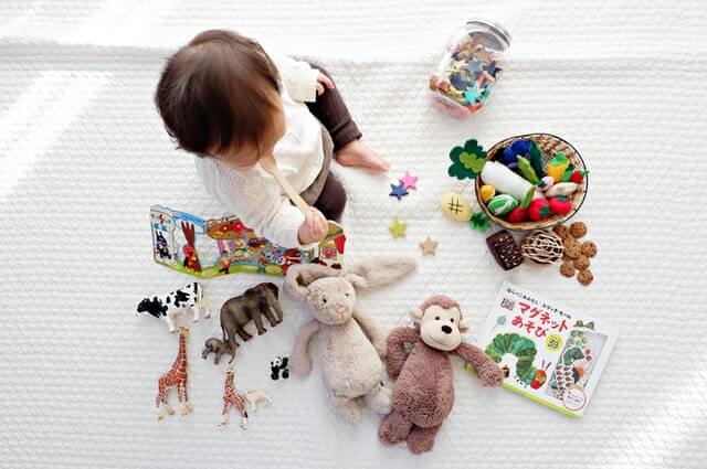 When can the baby start playing with toys?